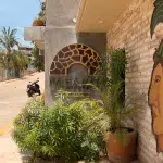 Schild und Eingang von Temazcal NA-HÁ MAYA